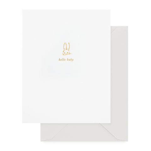 white hello baby card with gold text and bunny icon, antique grey envelope