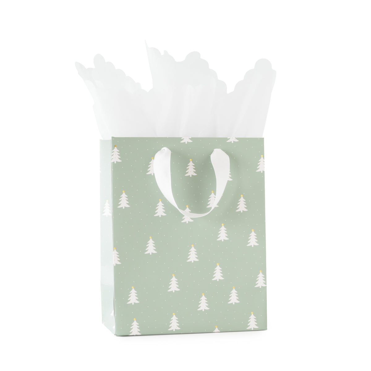 A mint green gift bag with a white pine Christmas tree pattern with gold foil details and white grosgrain ribbon handles, filled with white tissue paper