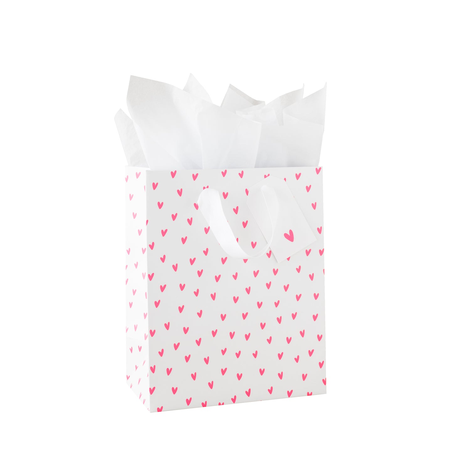 White gift bag with neon pink heart pattern, white tissue paper and a white gift tag with a neon heart pattern