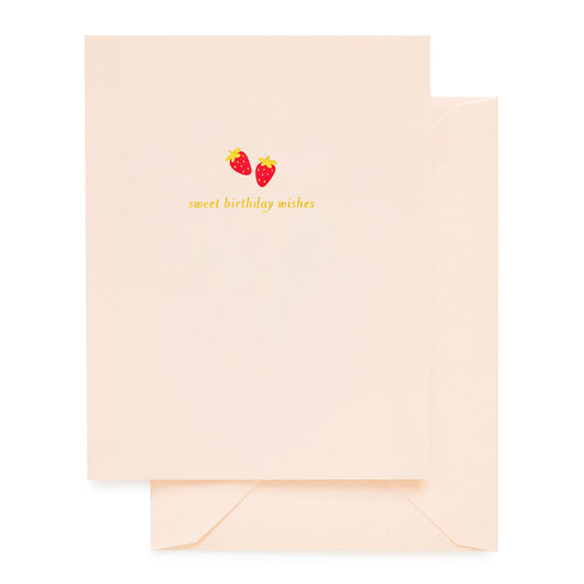 Pale pink birthday card with red strawberries and sweet birthday wishes printed