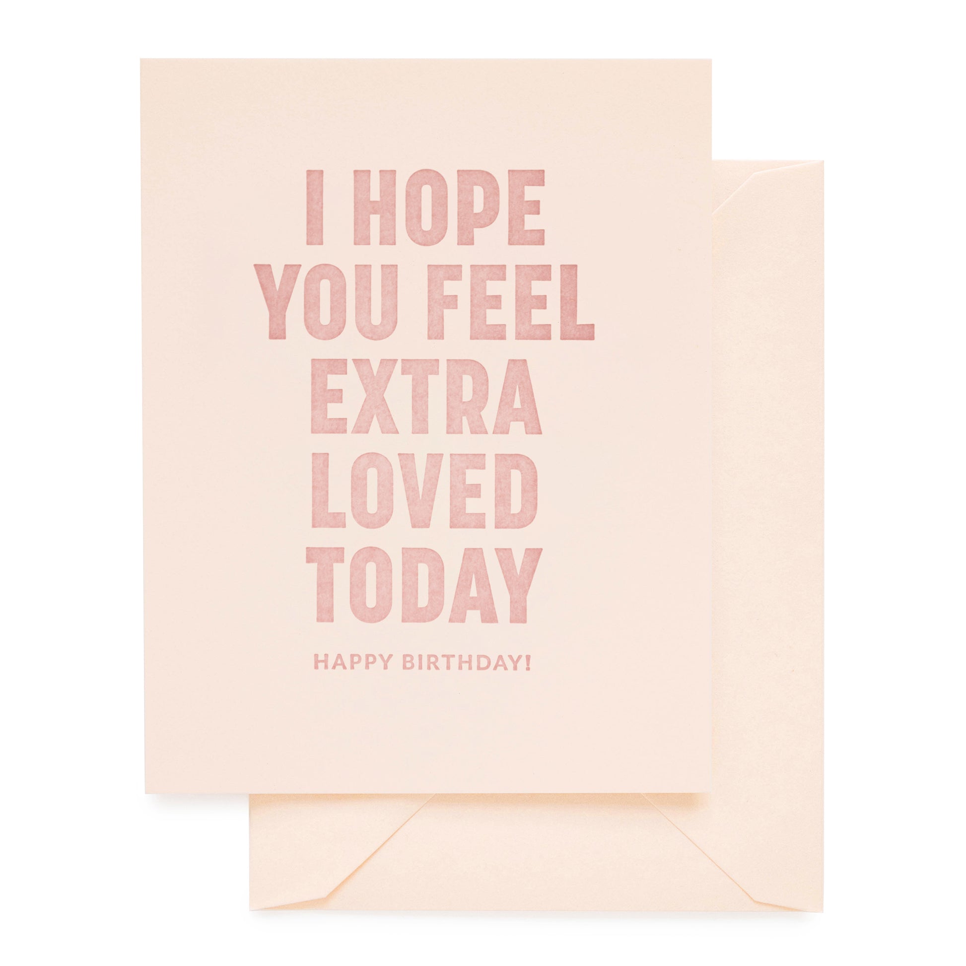 Pale pink card and envelope letterpress printed with i hope you feel extra loved today happy birthday