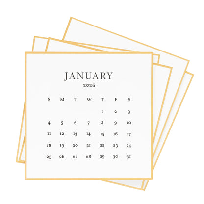 Stack of calendar cards for January 2026 with a gold border and black ink