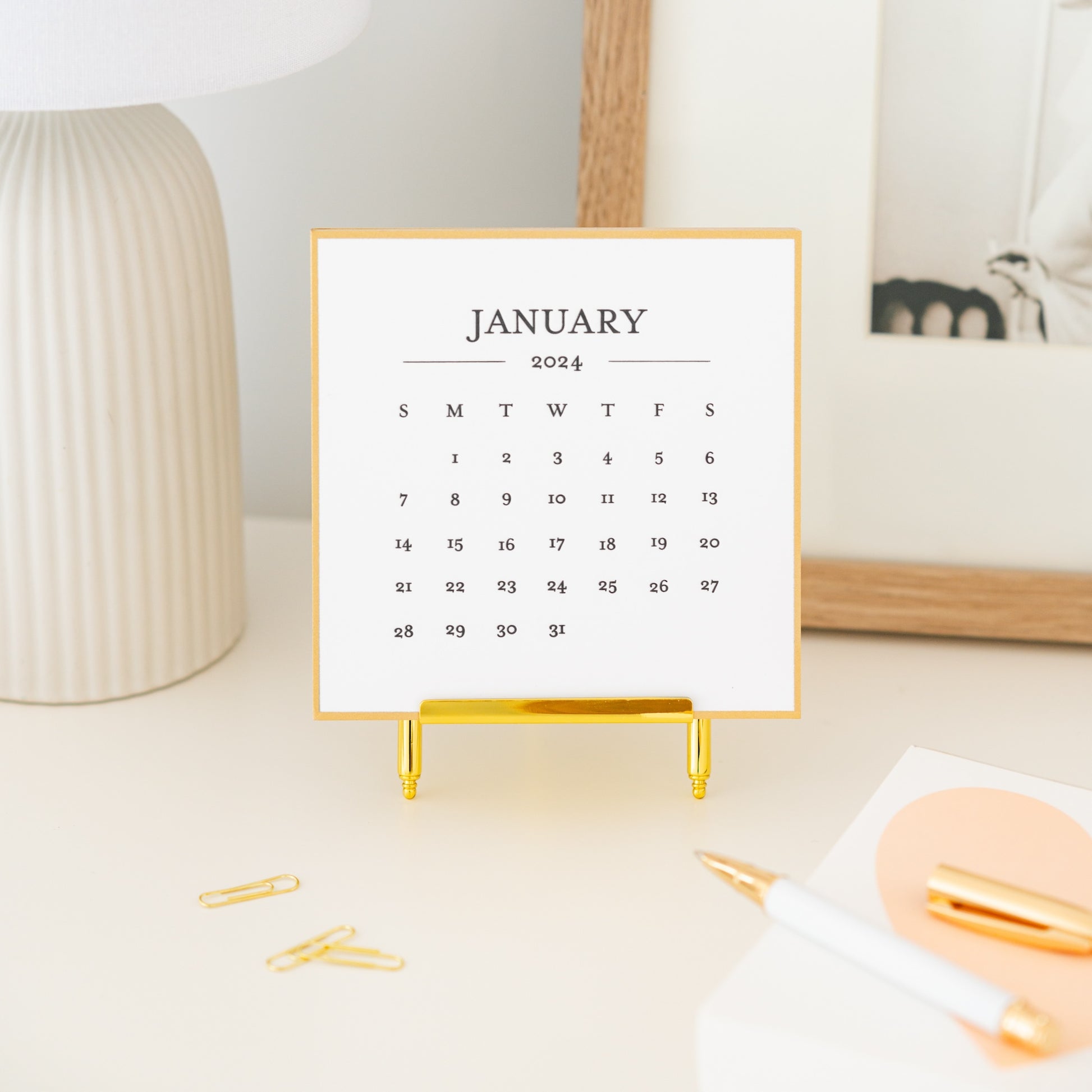 Black desk calendar on desk