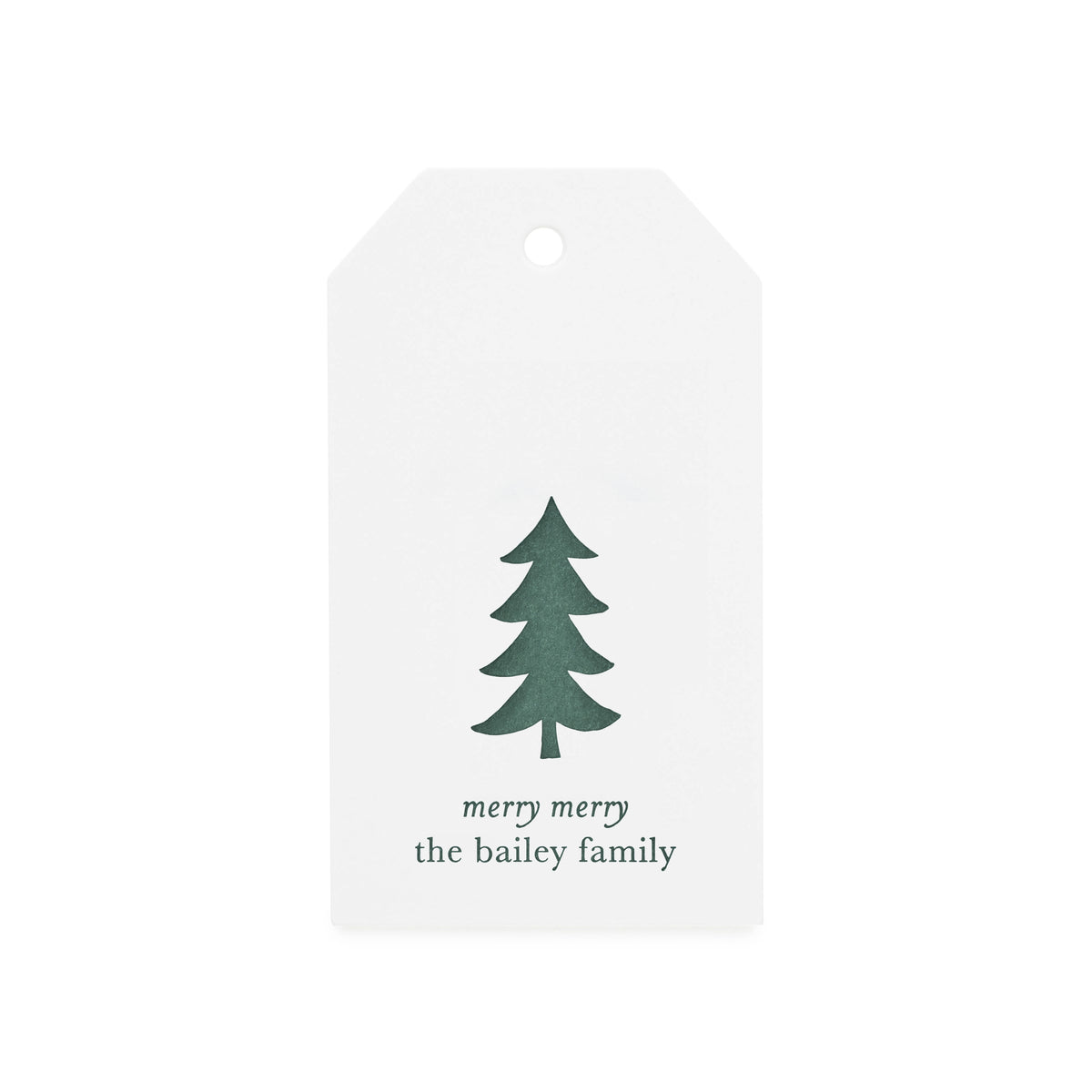 White gift tag with dark green Christmas tree printed with 'merry merry the bailey family' in dark green letterpress ink