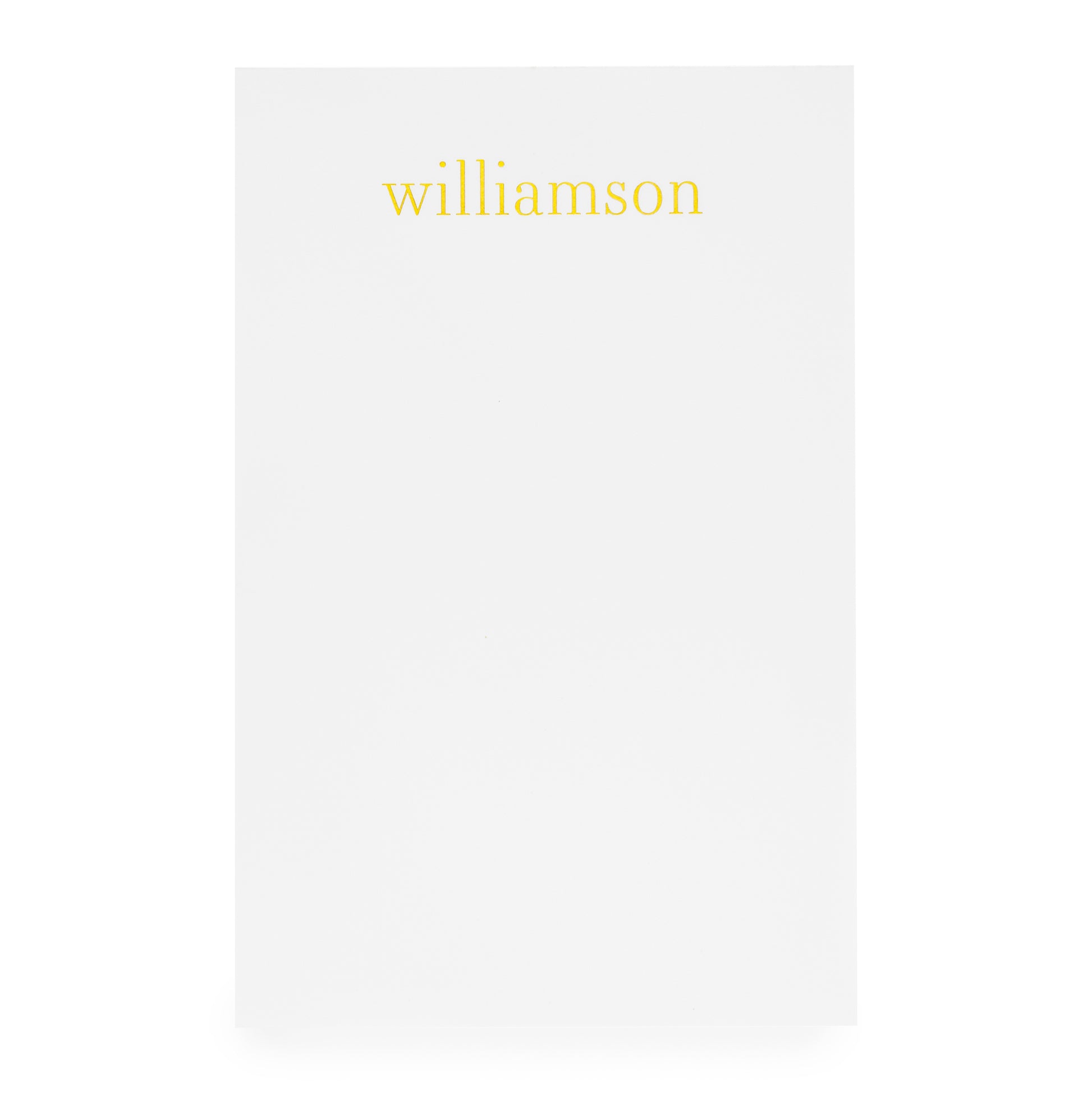 White notepad with gold foil 'williamson'