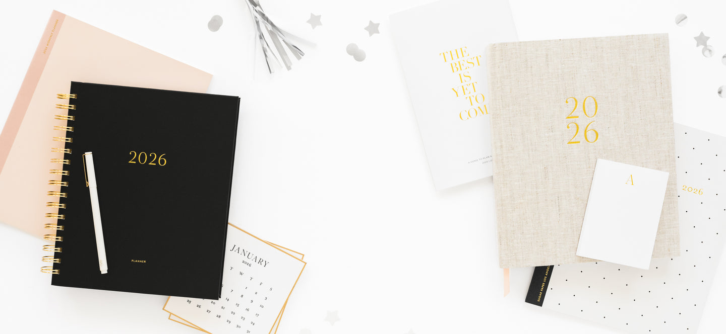 Two planners for 2026 on a white background with decorative elements.