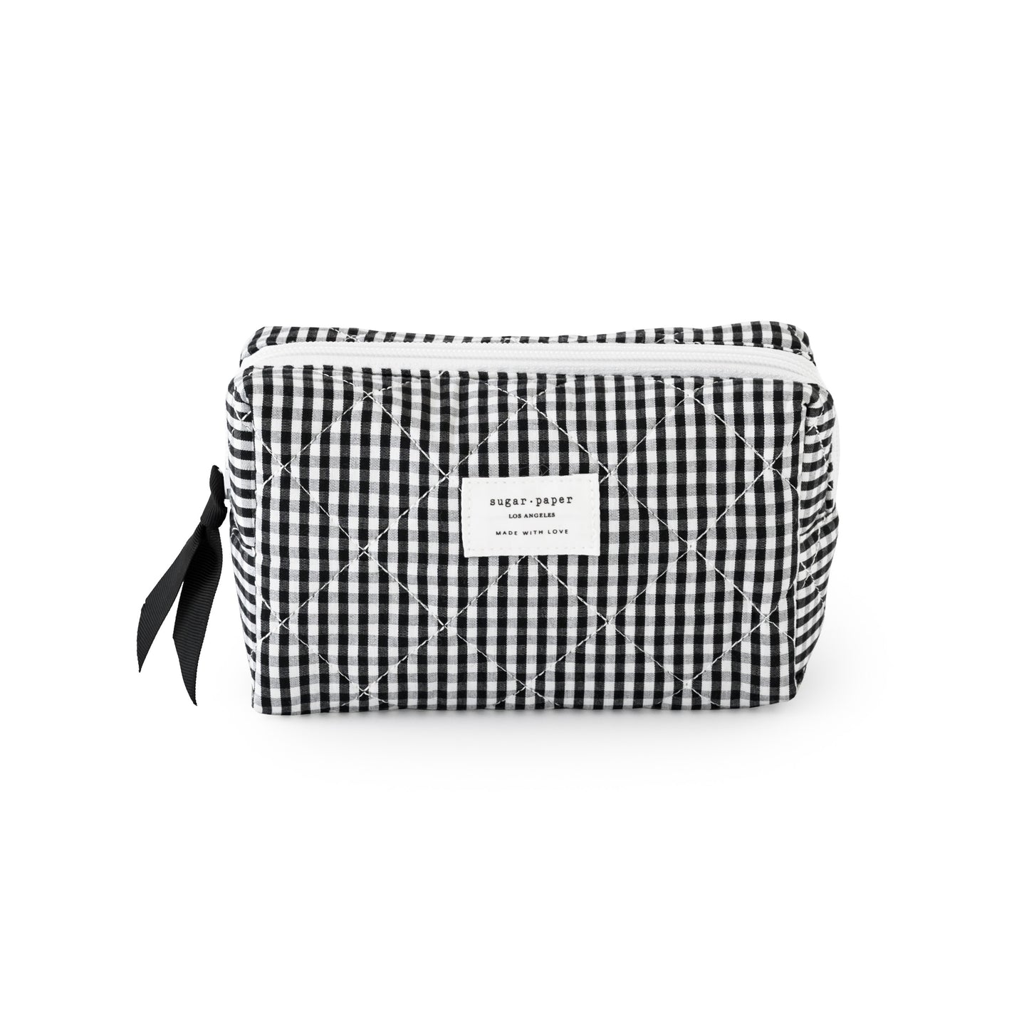 Black and white checkered pouch with a sugar paper logo, with a black ribbon and white zipper
