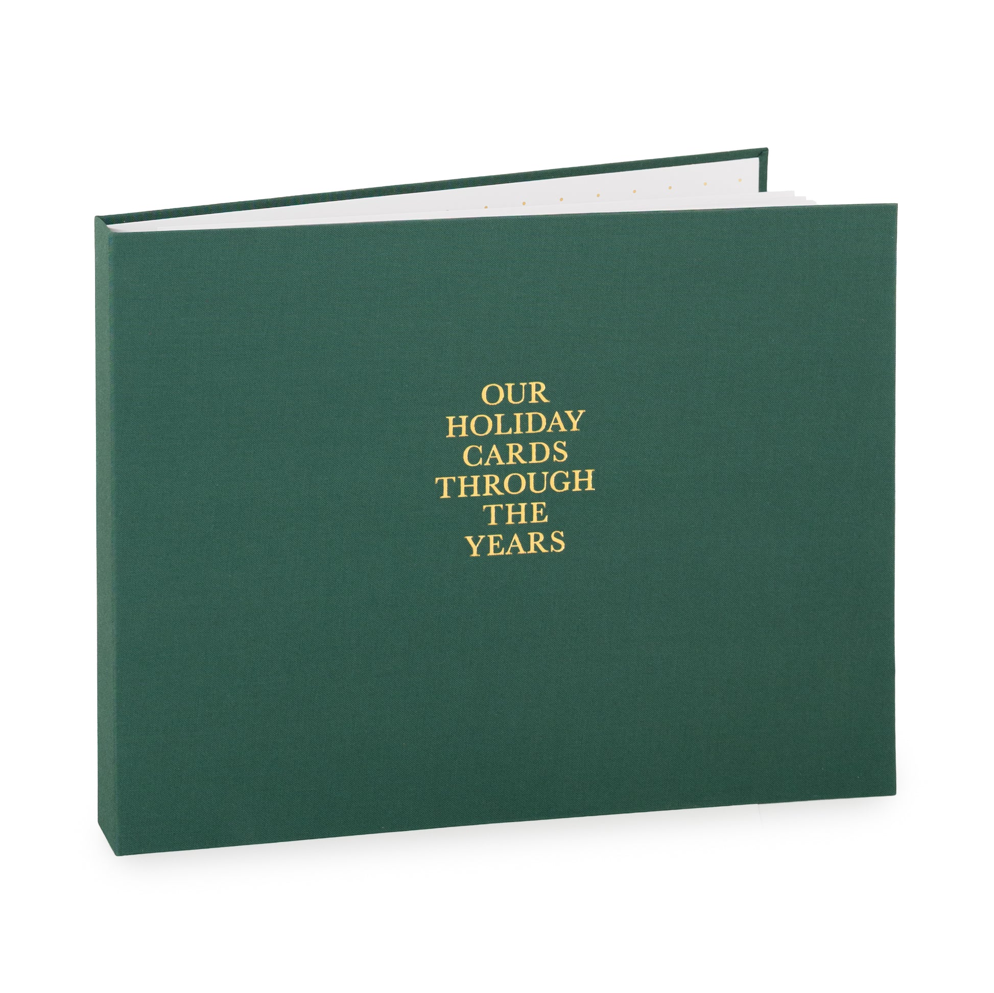 Dark green holiday card spiral bound fabric book with 'our holiday cards through the years' on cover