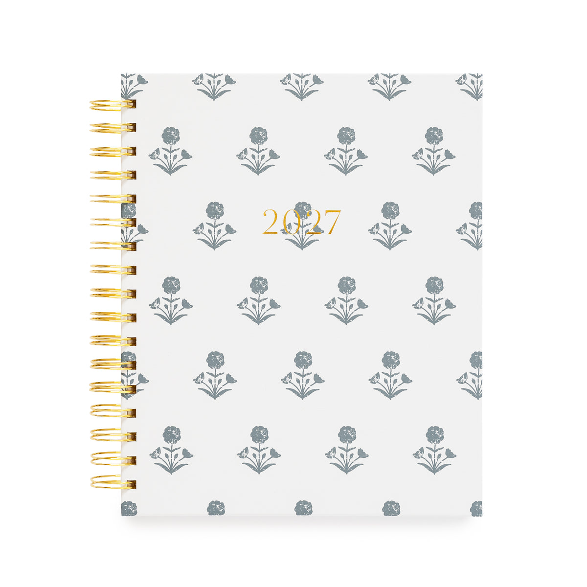 A 2027 spiral-bound planner with a white cover with a blue floral pattern and gold foil text reading '2027' in the center. The left side features a gold-tone spiral coil binding.