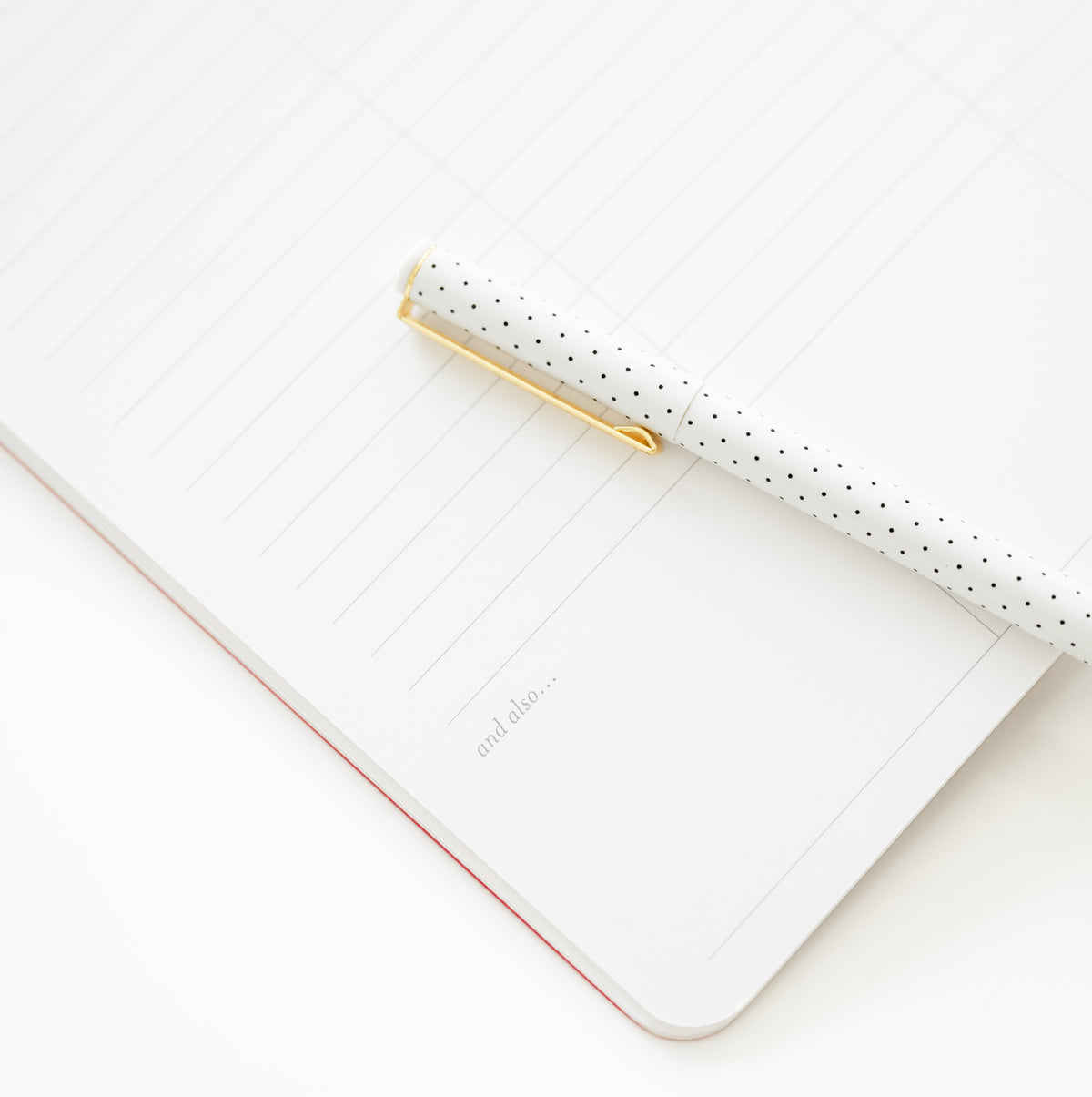 A white lined interior of plannerwith the words 'and also.'