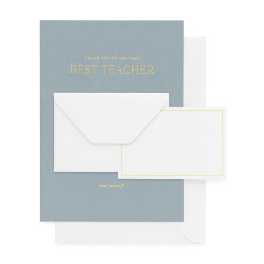 Dusty blue card foil printed with 'thank you to the very best teacher treat yourself' with a mini enclosure card and envelope paired with a white envelope