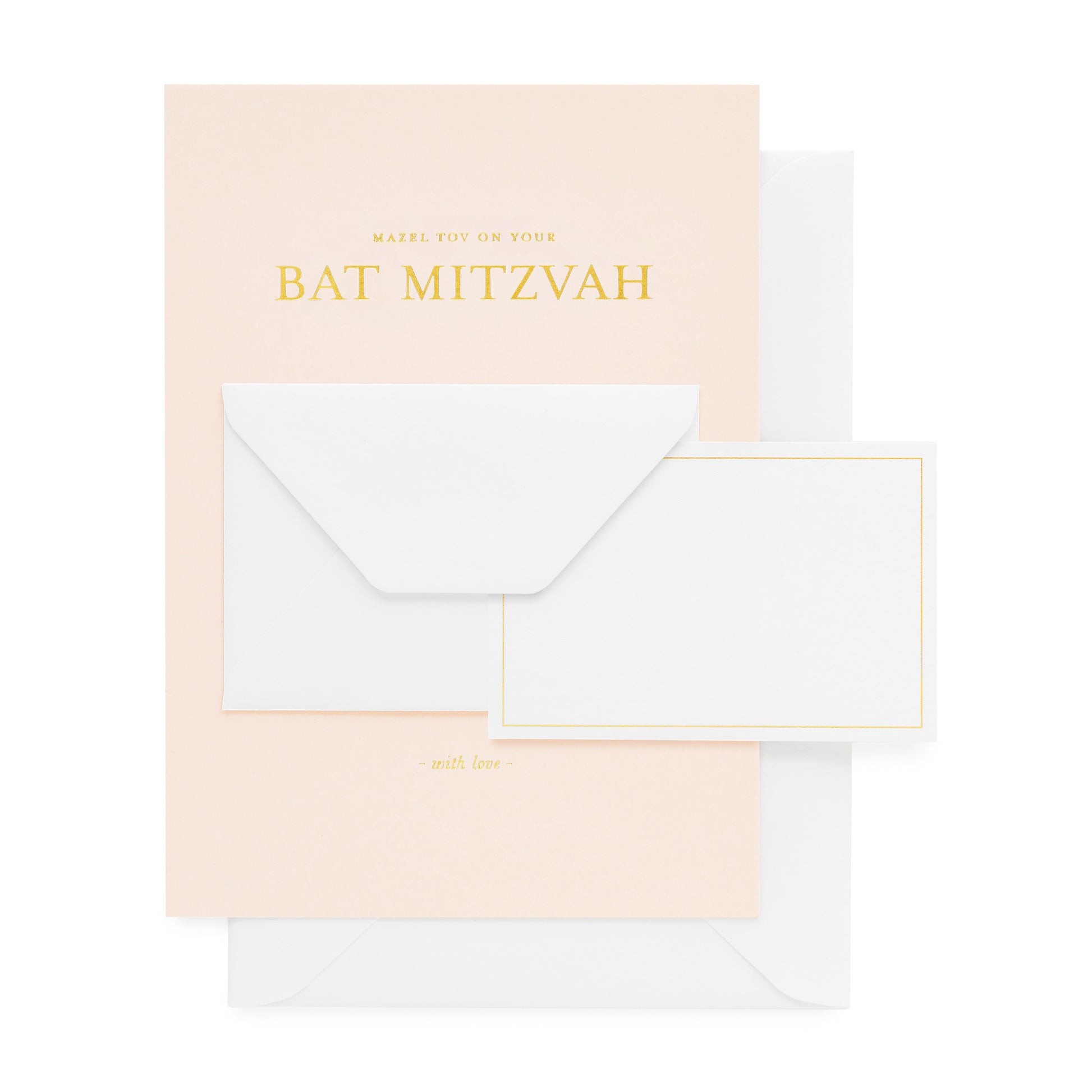Pale pink greeting card with white small envelope and mini card printed with 'mazel tov on your bat mitzvah' in gold foil paired with a white envelope