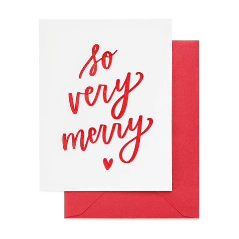 white christmas card with red text and red envelope