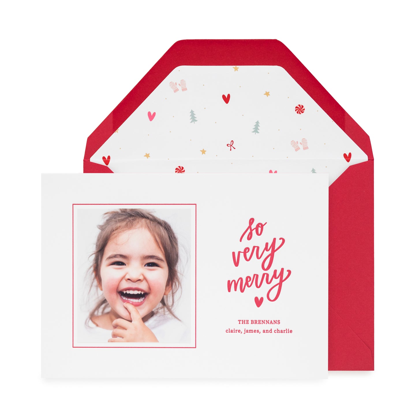 Red and white custom holiday card printed with so very merry and multicolor holiday icon envelope liner