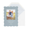 Blue scallop holiday photo card with white and champagne foil and blue striped liner