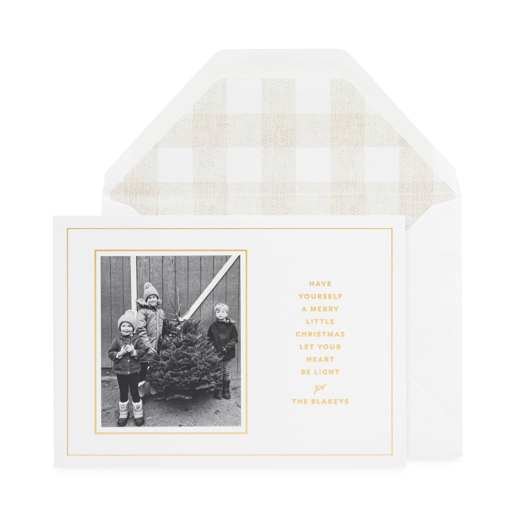 Gold foil custom holiday photo card with flax and white gingham envelope liner