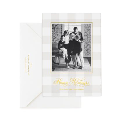 Green gingham custom holiday photo card with gold foil and envelope closed