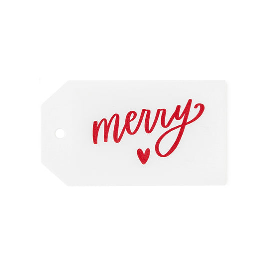 white tag with red merry text