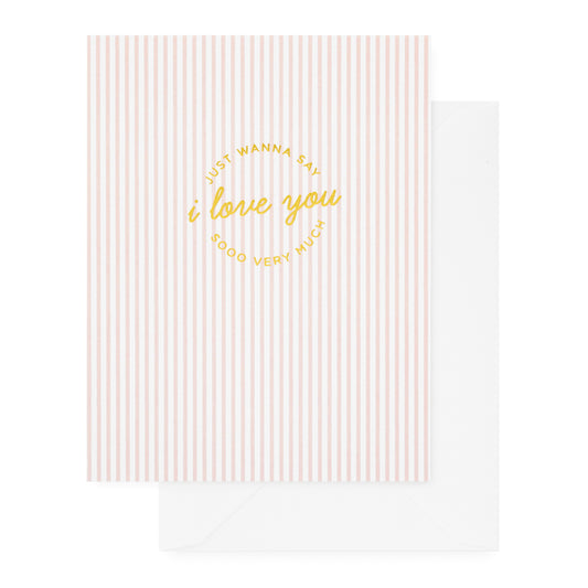 folded pink and white striped card with gold text