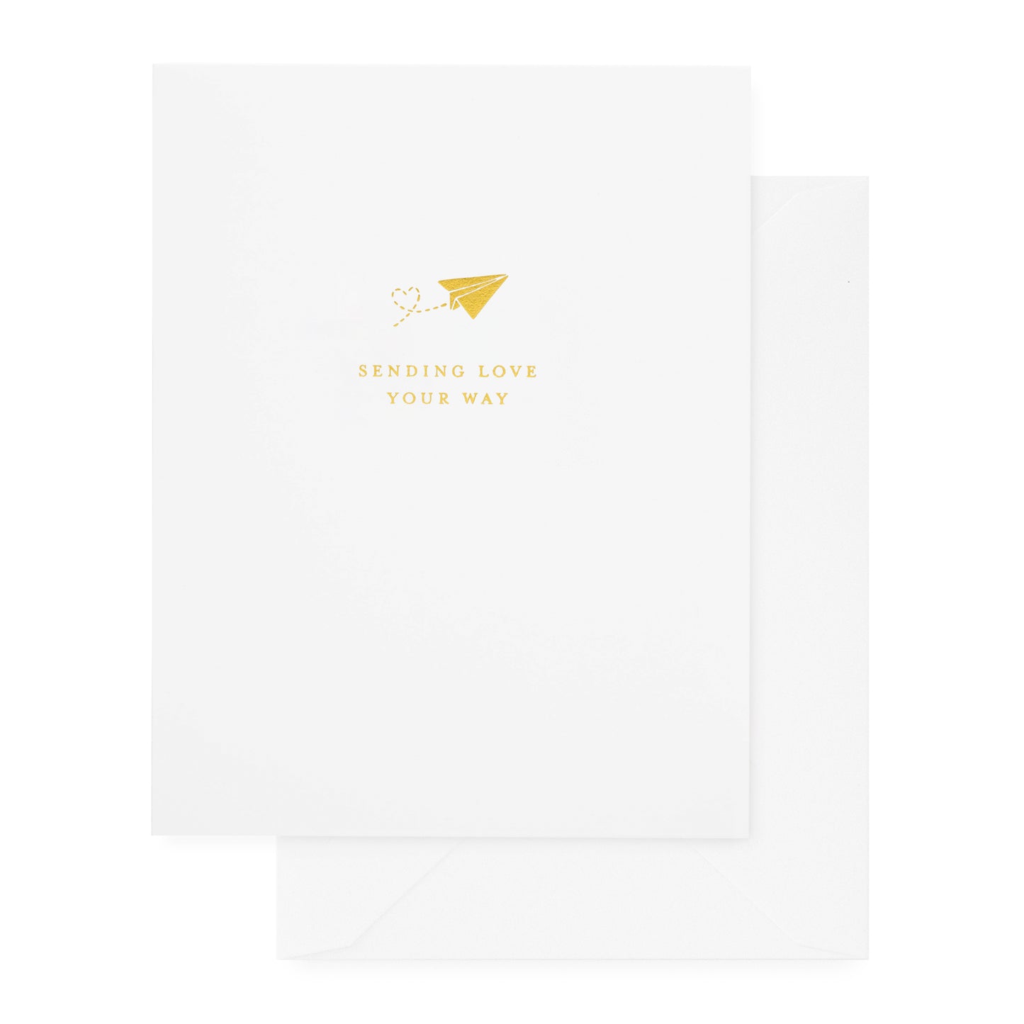 white folded card with gold sending love your way text with paper airplane icon