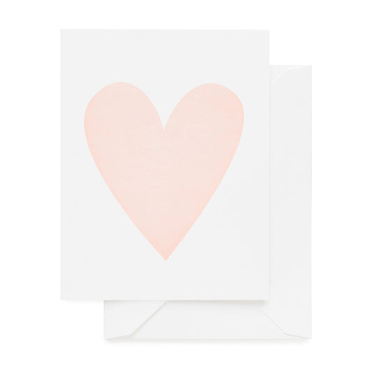 White card with a pink heart paired with a white envelope
