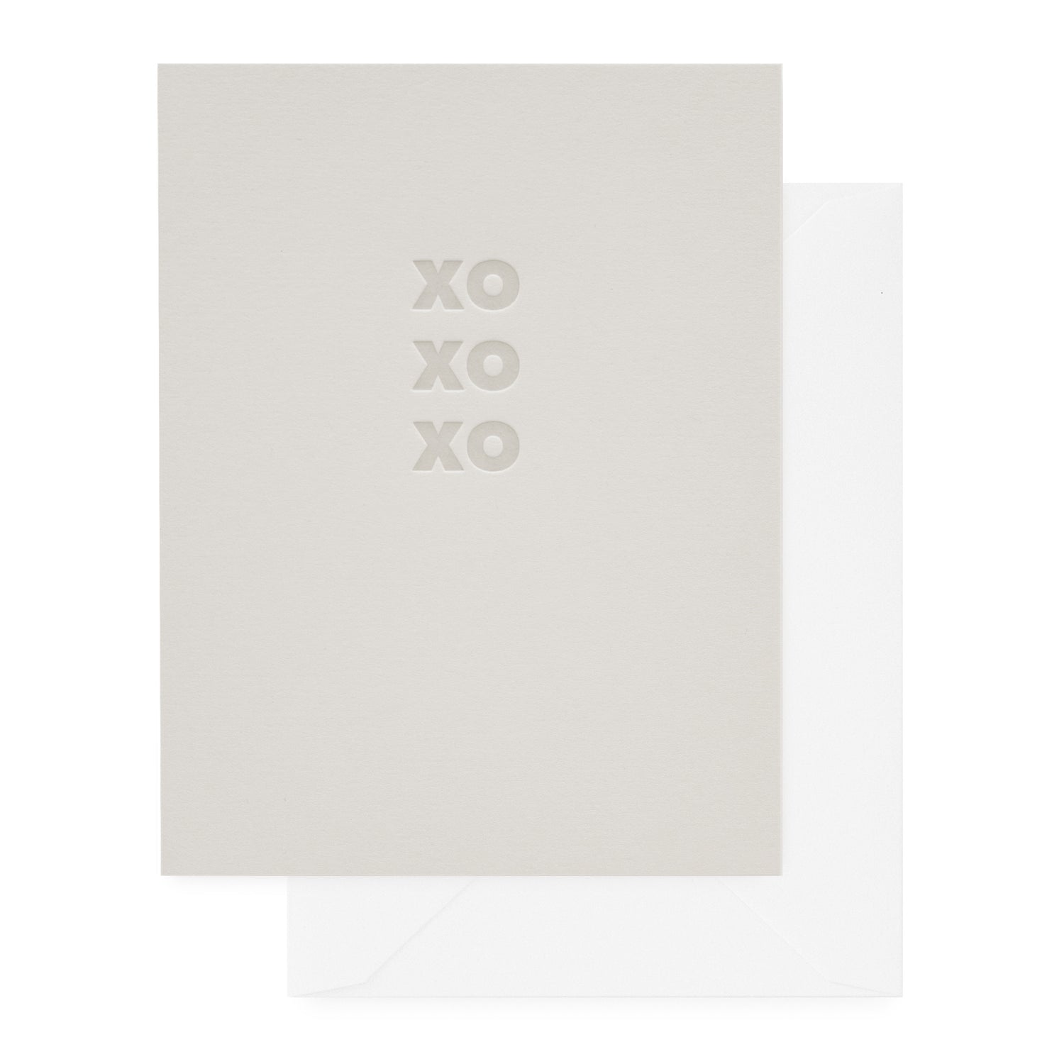 Pale grey card with 'xoxoxo' printed in grey ink paired with a white envelope}