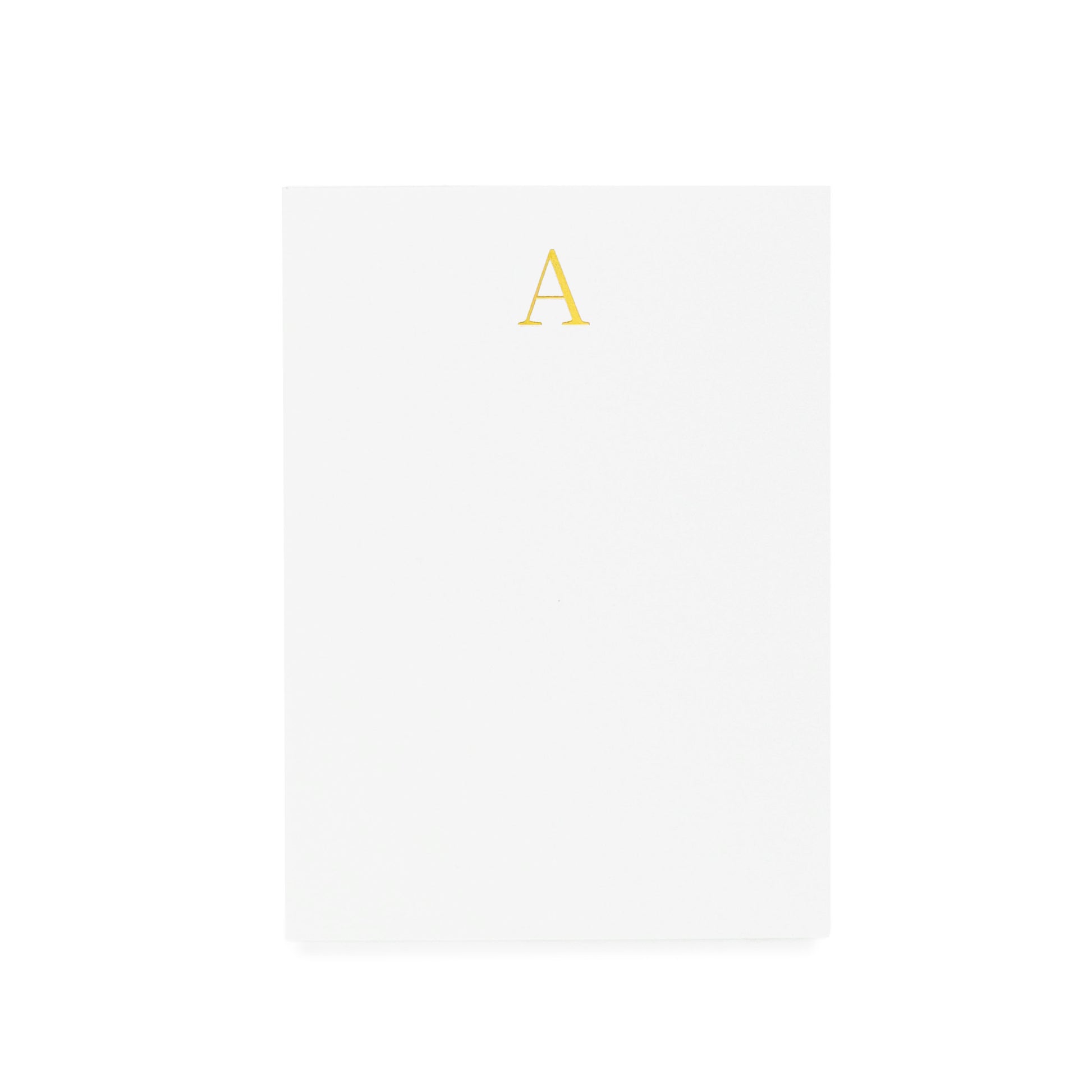 Mini white notepad with a gold foil 'A' on it
