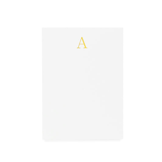 Mini white notepad with a gold foil 'A' on it