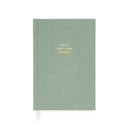 Sage green journal foil stamped in gold with daily gratitude journal