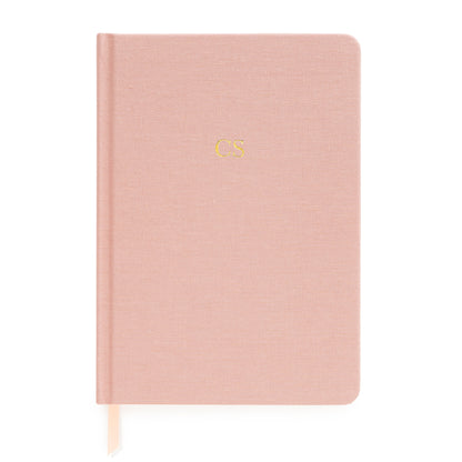 Rose linen journal with pink and white ribbon markers foil stamped with gold foil initials