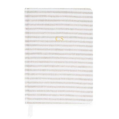 Beige and white striped journal with gold foil initials