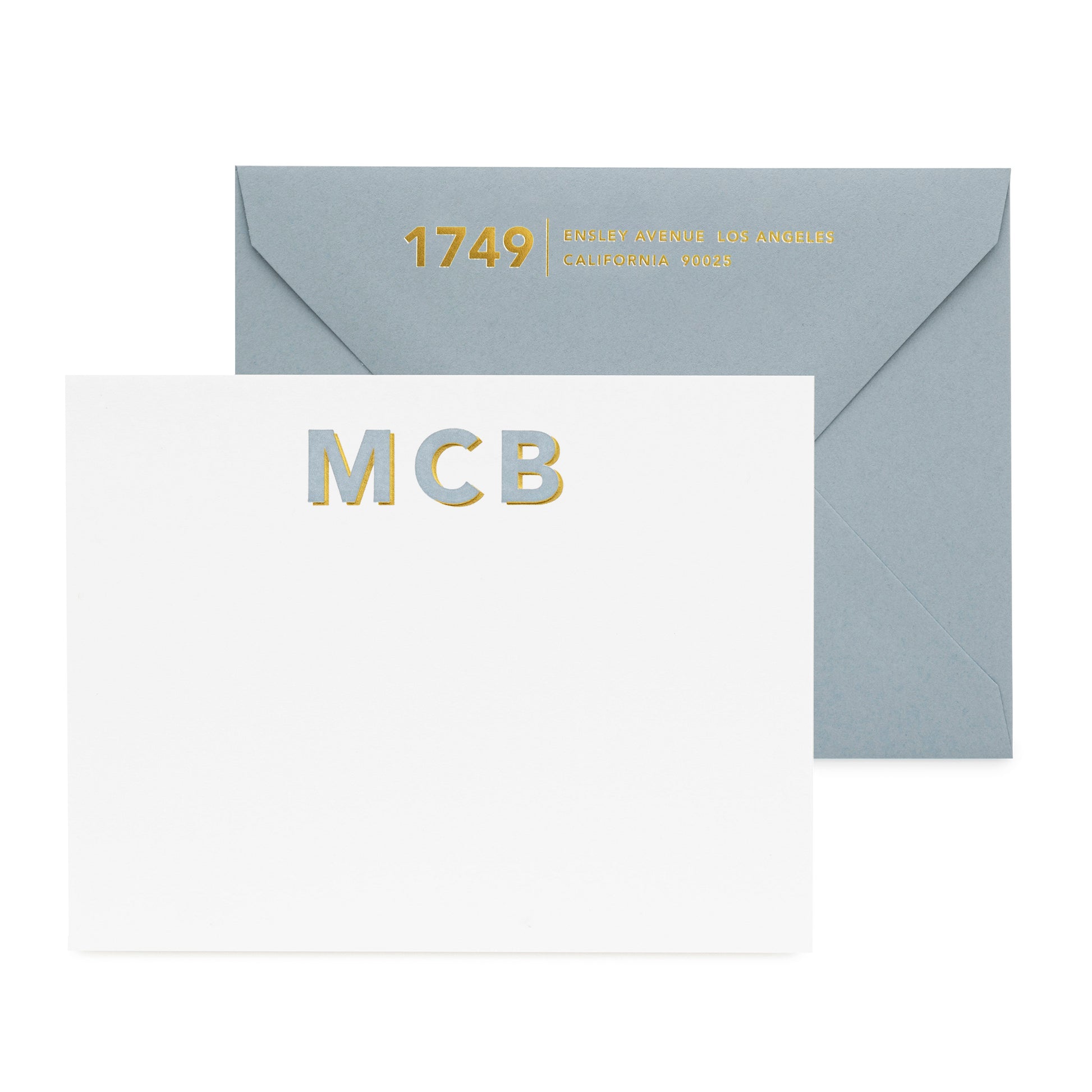 Large gold and slate blue initial stationery with slate blue envelope and dot liner