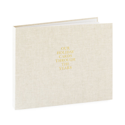 Flax fabric bound keepsake book with gold foil 'our holiday cards through the years' on cover