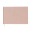 Rose Linen Wedding Guest Book stamped with gold foil "Guests" on the cover