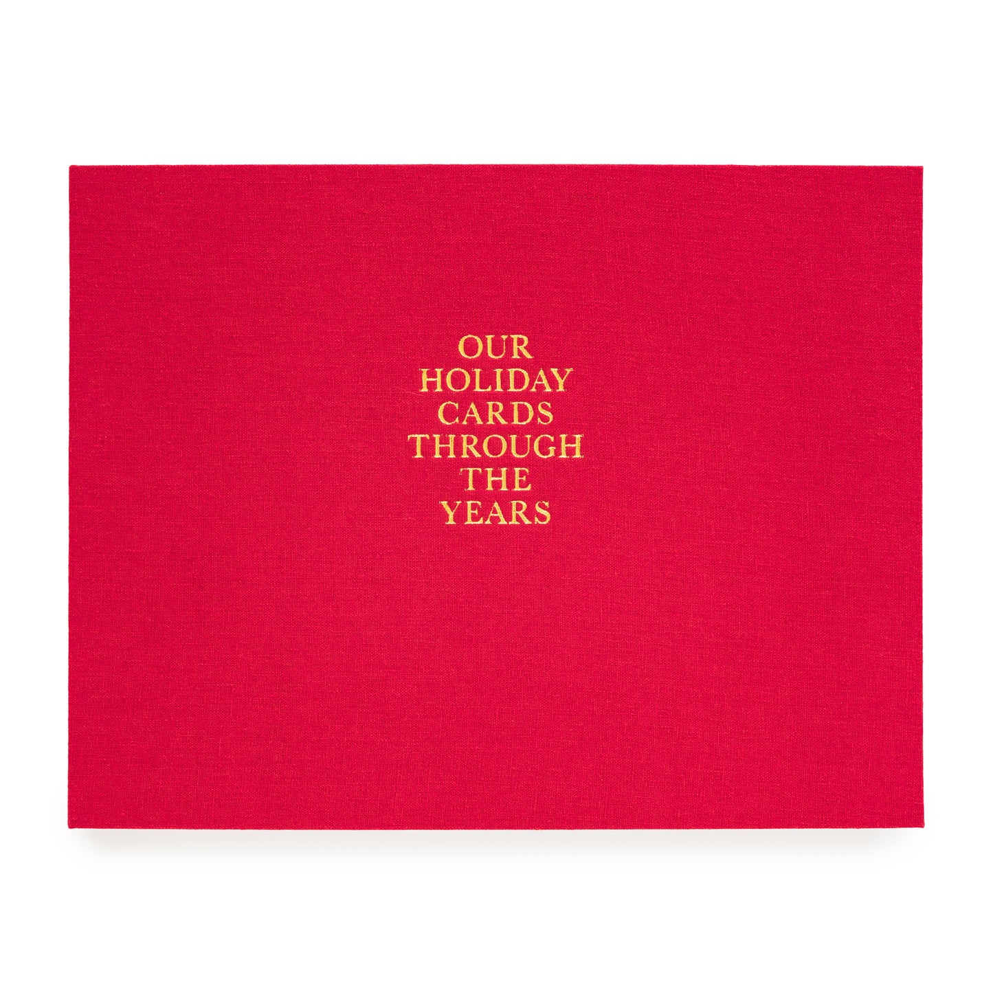 Red holiday card book printed with our holiday cards through the years