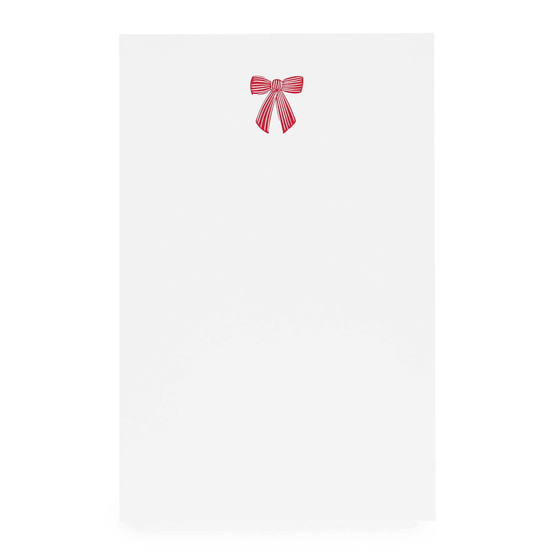 White notepad with red ribbon bow