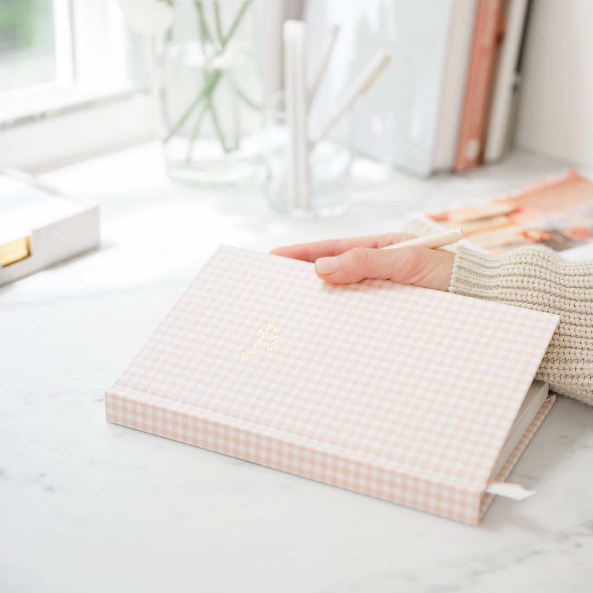 Pink gingham fabric small agenda with twenty six in gold foil on cover