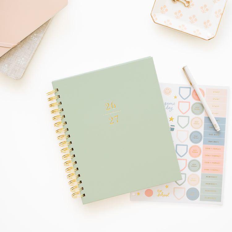 office green '26-27' student planner with stickers