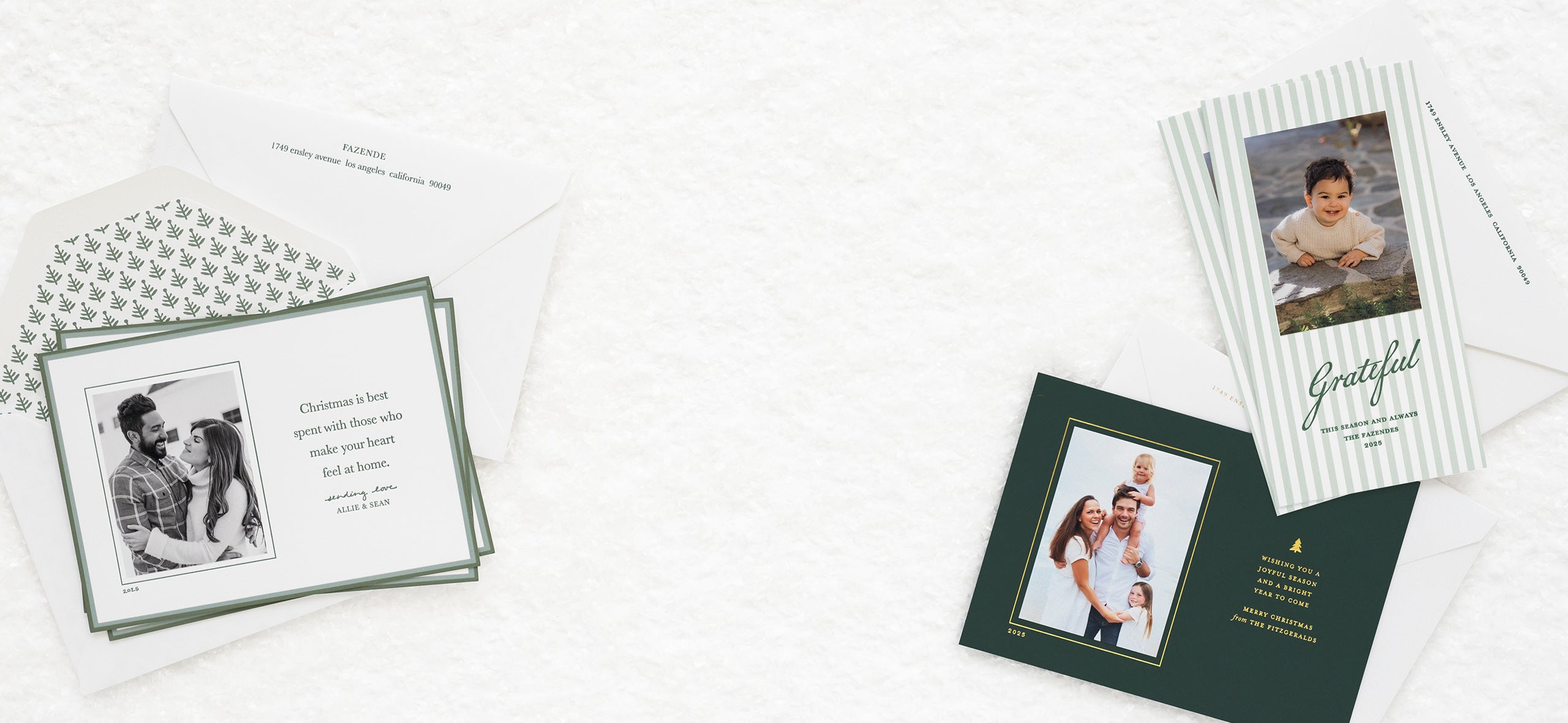 Banner of multiple custom holiday photos cards in a green, white, and gold palette with christmas greetings