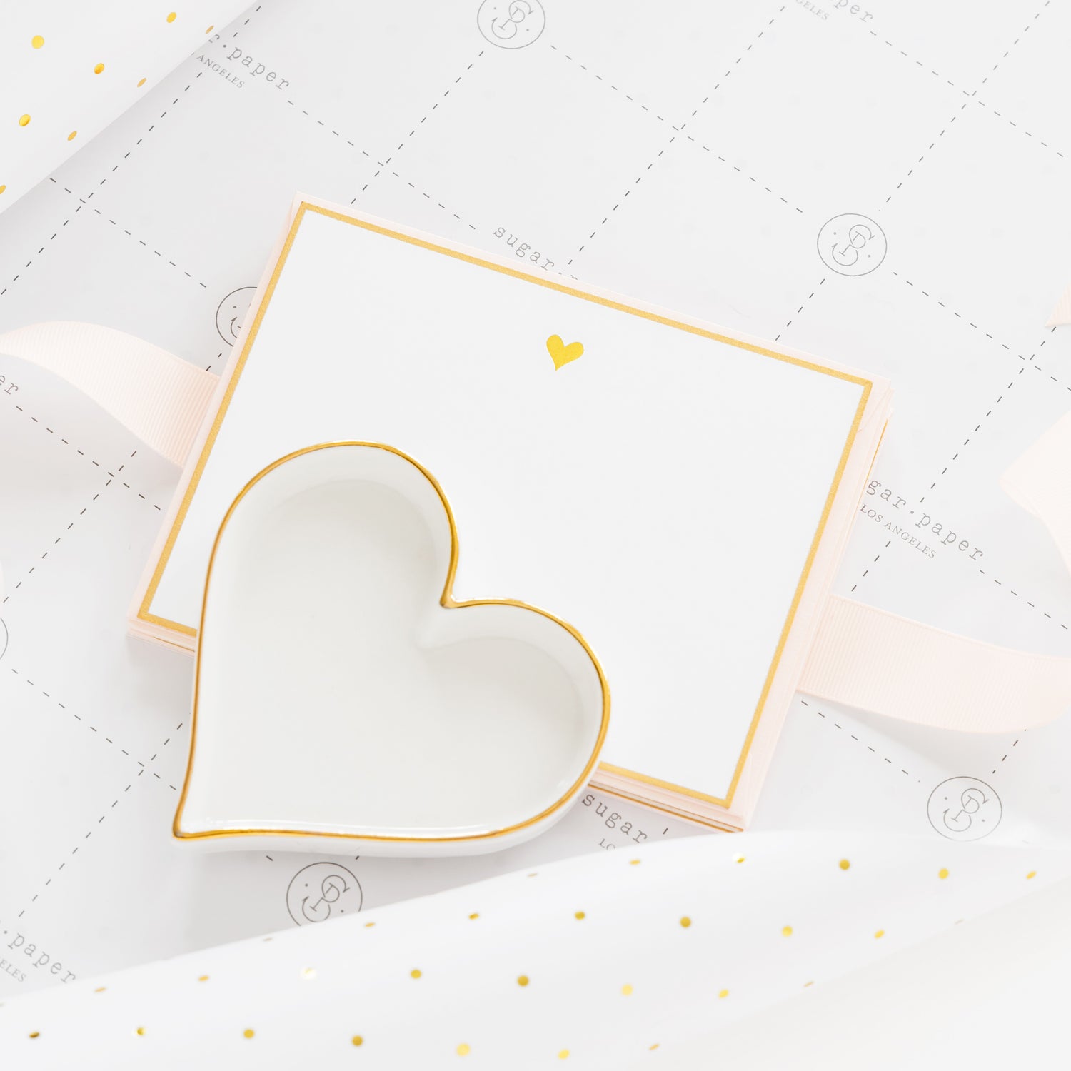 Gold heart note card with gold border paired with a gold heart ceramic trinket tray as a teacher or graduation gift