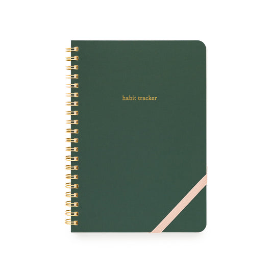Green habit tracker notebook with gold spiral binding and pink elastic