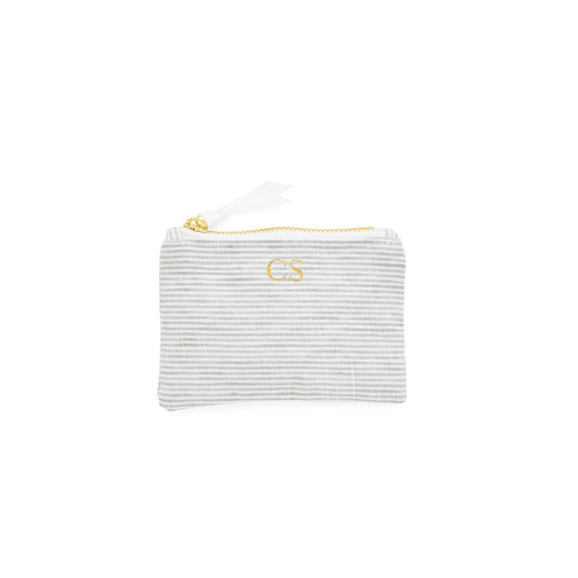 Striped mini pouch with a gold zipper, white ribbon pull, and gold foil initials