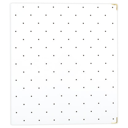white binder with black dots