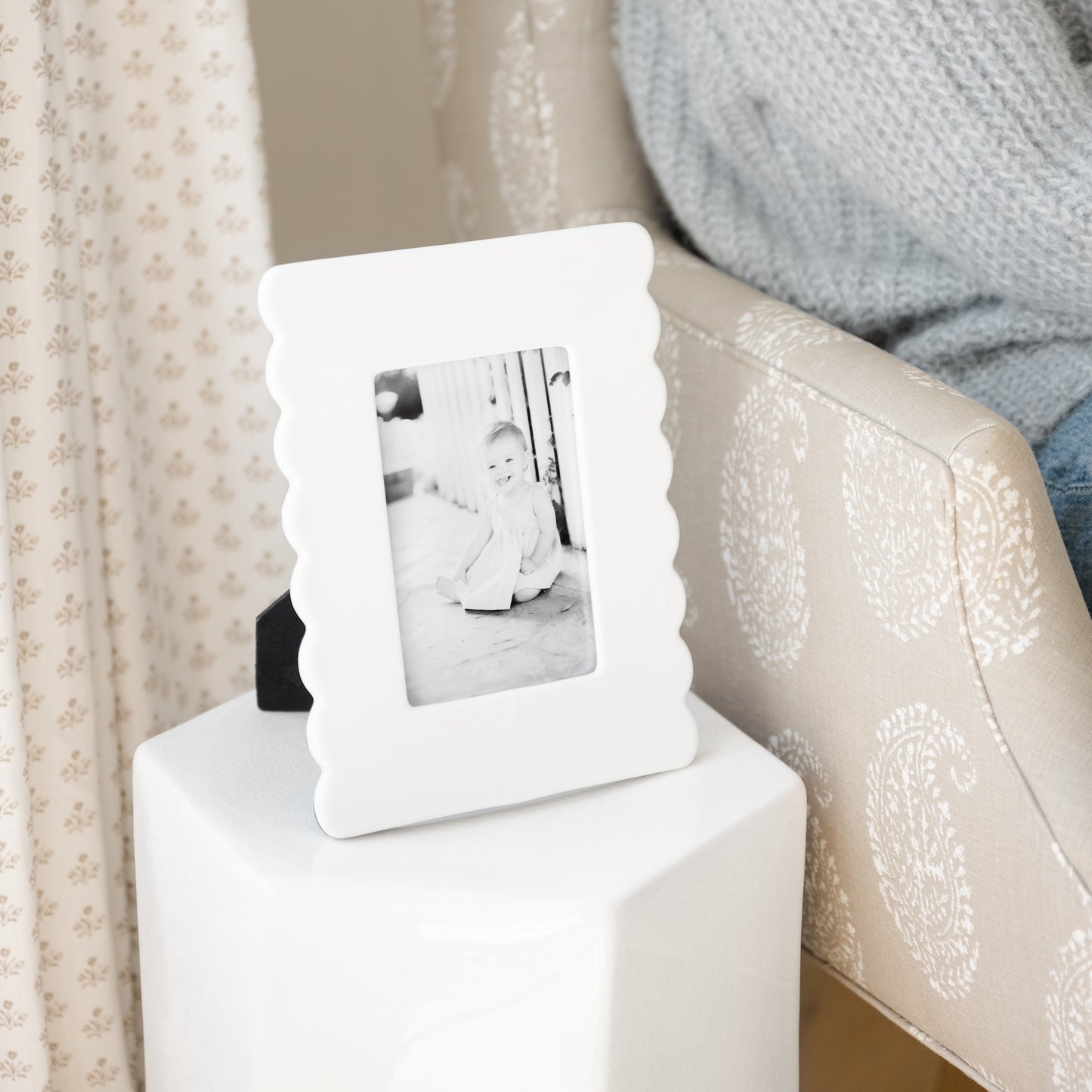 White Scallop Frame on End Table next to Side Chair