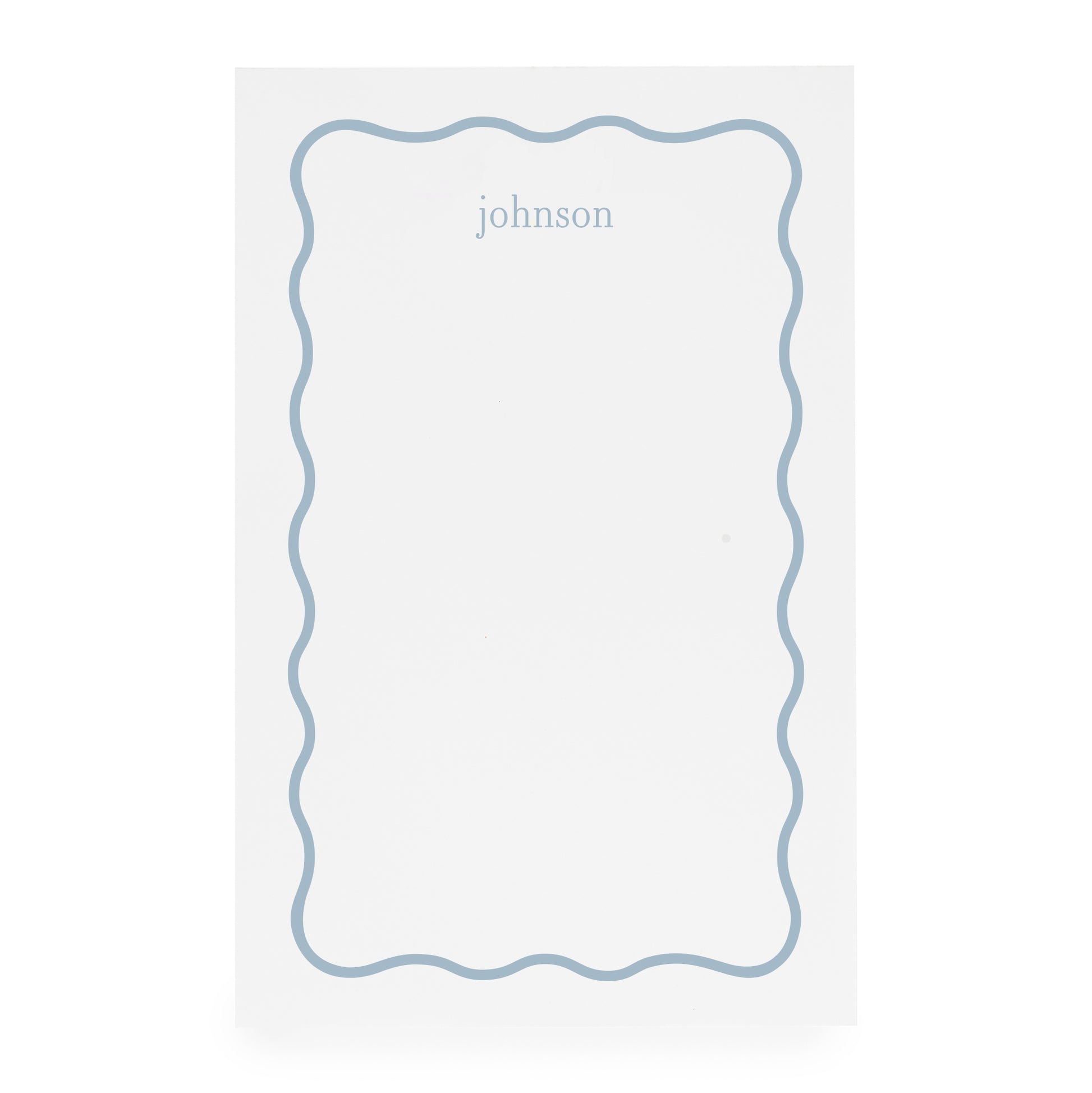 White notepad with blue scallop border and blue 'johnson' text