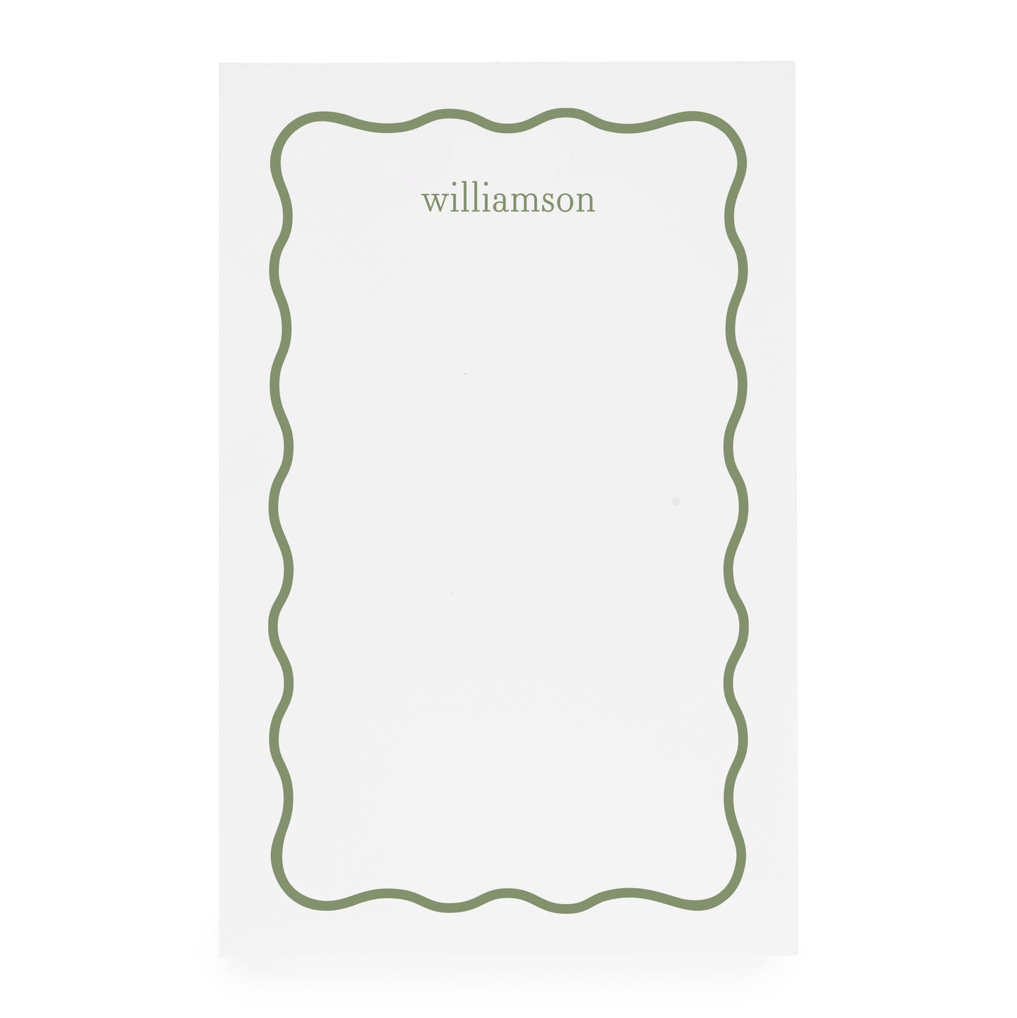 White notepad with green scallop border and 'williamson' in green ink
