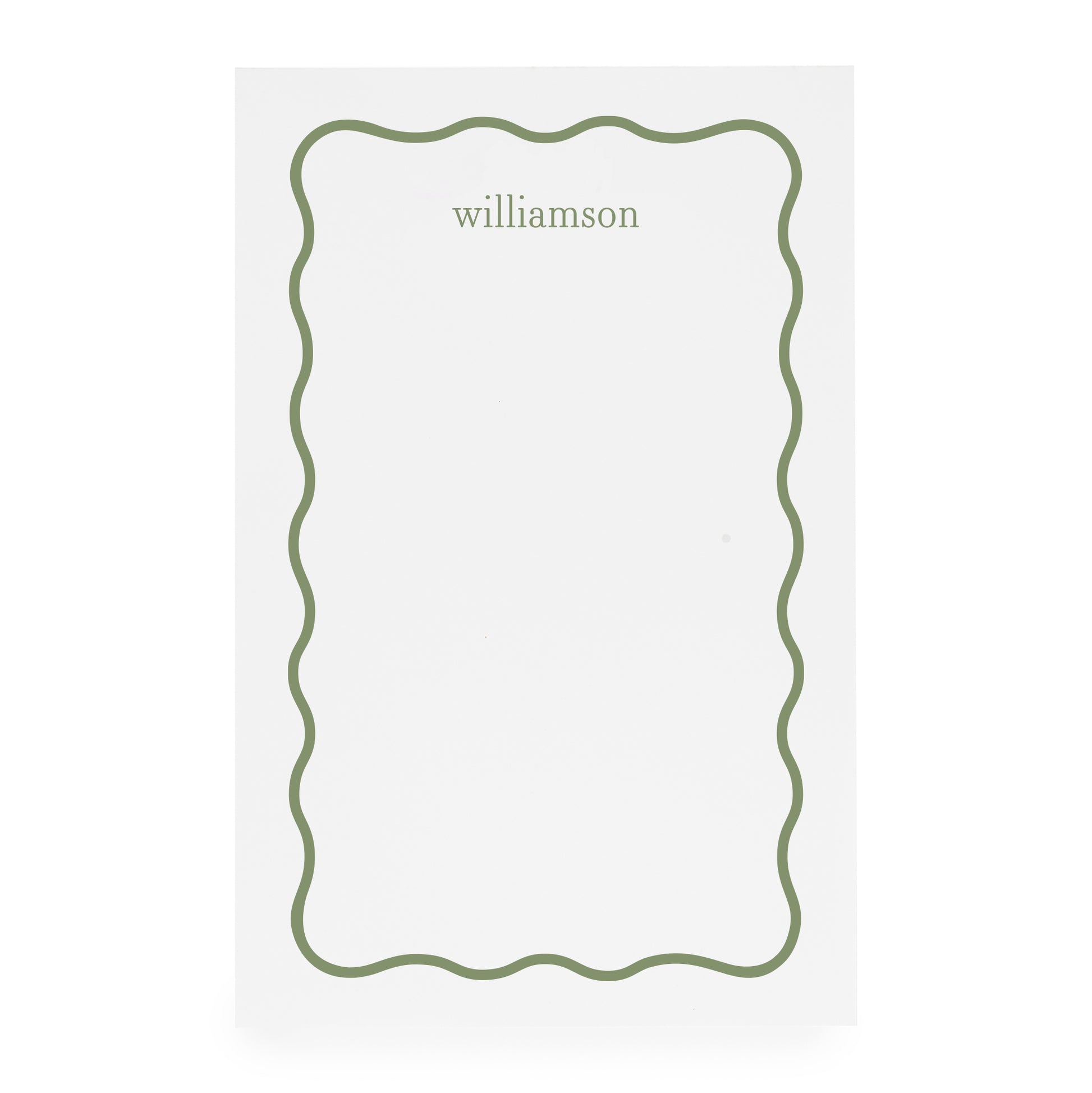 White notepad with green scallop border and 'williamson' in green ink