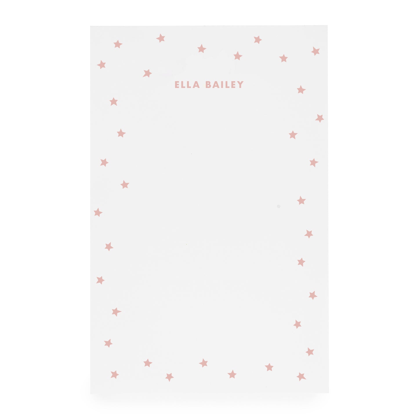 White notepad with scattered star bordered and 'ella bailey' text in rose ink