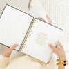2024 planner in hand with page start each day with a grateful heart