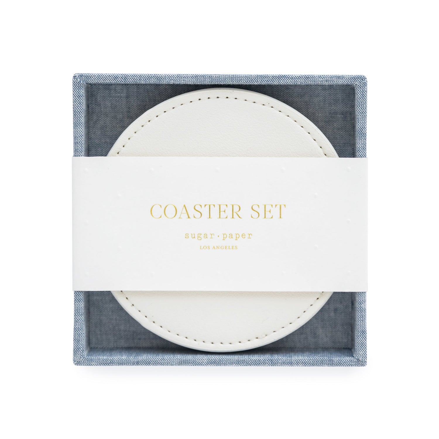 White coasters in chambray fabric holder}